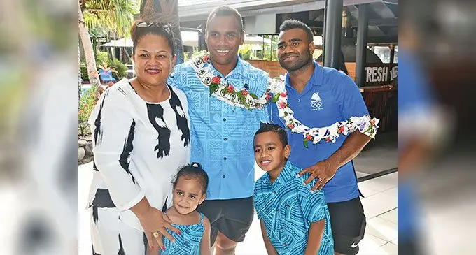 Fiji men’s rugby sevens head coach, Osea Kolinisau (middle) and captain Jerry Tuwai with family members at Tanoa International Hotel in Nadi on August 4, 2024. Photo: Salote Qalubau