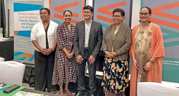 A photograph of Fiji Human Rights and Anti-Discrimination Commission commissioner Chantelle Khan, commissioner Veena Singh, chairperson Pravesh Sharma, commissioner Alefina Vuki, and director Loukinikini Lewaravu.