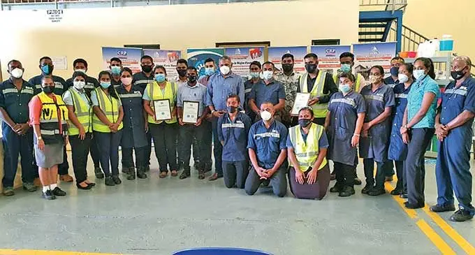 (Front, Standing seventh from left) Minister for Commerce, Trade, Tourism and Transport Faiyaz Koya with staff members of Roofing & Profile (Fiji) Pte Ltd.. Photo: Source: RC Manubhai & Co PTE LTD