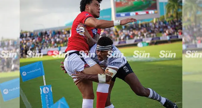 Vodafone Flying Fijians winger Vinaya Habosi tackles a Tongan player during their match at the HFC Bank Stadium on July 2, 2022. Photo: Leon Lord
