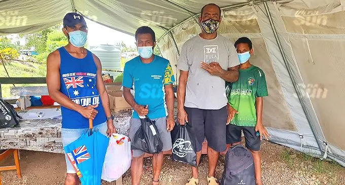 From left: Sitiveni Naivalu, Orisi Aliki, Lui Ravulolo and Junior Ravulolo with food and supplies for family members admitted at the Labasa Hospital. Photo: Sampras Anand