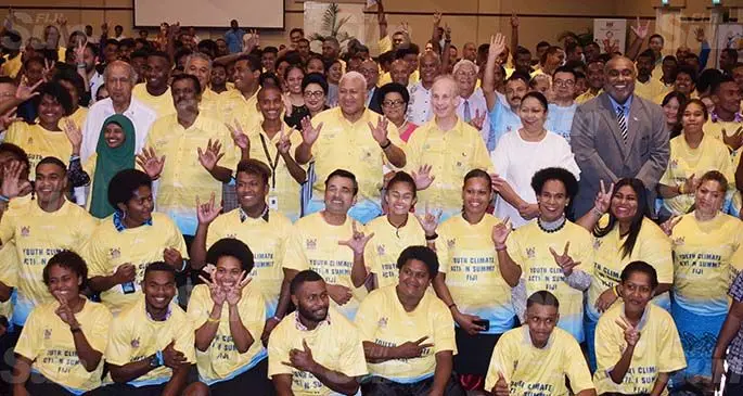 Prime Minister Voreqe Bainimarama (centre), with youths, Government ministers, officials during the opening of the National Youth Climate Action Summit at the Grand Pacific Hotel in Suva on March 16, 2021. Photo: Ronald Kumar