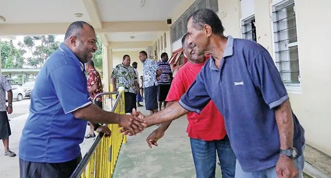 Minister for Health and Medical Services Dr Ifereimi Waqanibete (left) meets patients at the Vunidawa Hospital in Naitasiri  yesterday. Photo: Kelera Sovasiga
