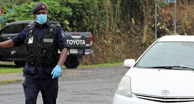 Our frontline workers ensuring that containment zones are maintained. Photo: Fiji Police Force