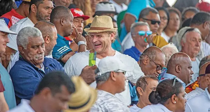 Crusaders head coach Scott Robertson (with hat) shares a light moment with Commissioner of Police Brigadier-General Sitiveni Qiliho during the Pacific Nations Cup clash at Churchill Park, Lautoka, on July 9, 2022. Photo: Leon Lord