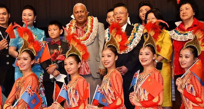 From left (standing) Prime Minister Voreqe Bainimarama, China’s Ambassador to Fiji Qian Bo (third from left) wife of the Chinese Ambassador Madame Lu (fifth from left) and the President of Chinese Community in Fiji Jenny Seeto in Suva on September 8, 2019 at the 70th anniversary of the founding of the People’s Republic of China. Photo: DEPTFO News