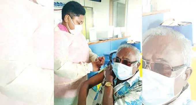 Gyan Prakash, 70, receives his booster shot vaccination from staff nurse, Elesi Solinibau at Ashabhai office in Vatuwaqa as the vaccination drive was organised for their staff and their families on  January 5, 2022. Photo: Ronald Kumar