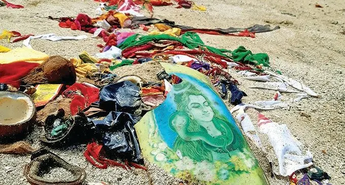 Prayer materials  left behind on Saweni beach by worshippers.