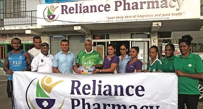 Nadi FA executive Mohameed Mohin Rafiq (fifth from left) receives medical assistance from Reliance Pharmacy director Ryan Prasad in Nadi on March 31, 2021. Photo: WAISEA NASOKIA 
