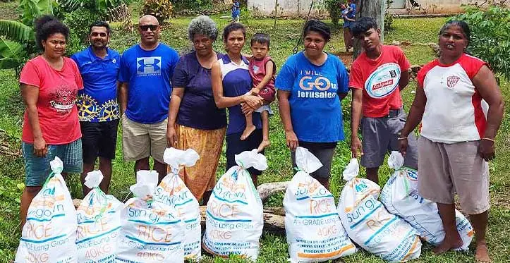 From the left: Fane Mate with Rotary Club Labasa treasurer Rajneel Maharaj, Westpac Fiji staff Josevata Uluikade, and residents of Rara HART settlement at Lajonia, Labasa, on November 4, 2023.