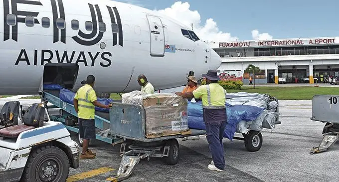 Relief supplies being unloaded from a Fiji Airways Boeing 737-800 at the Fua’amotu International Airport in Tonga on February 15, 2018.  Photo: Waisea Nasokia