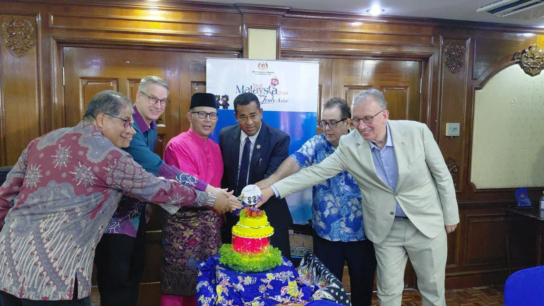 Acting Prime Minister Filimoni Vosarogo joins Malaysian High Commissioner Nor’Azam Mohd Idrus and guests in cutting a cake to launch the Visit Malaysia Year 2026 campaign at Rumah Malaysia on Wednesday night.