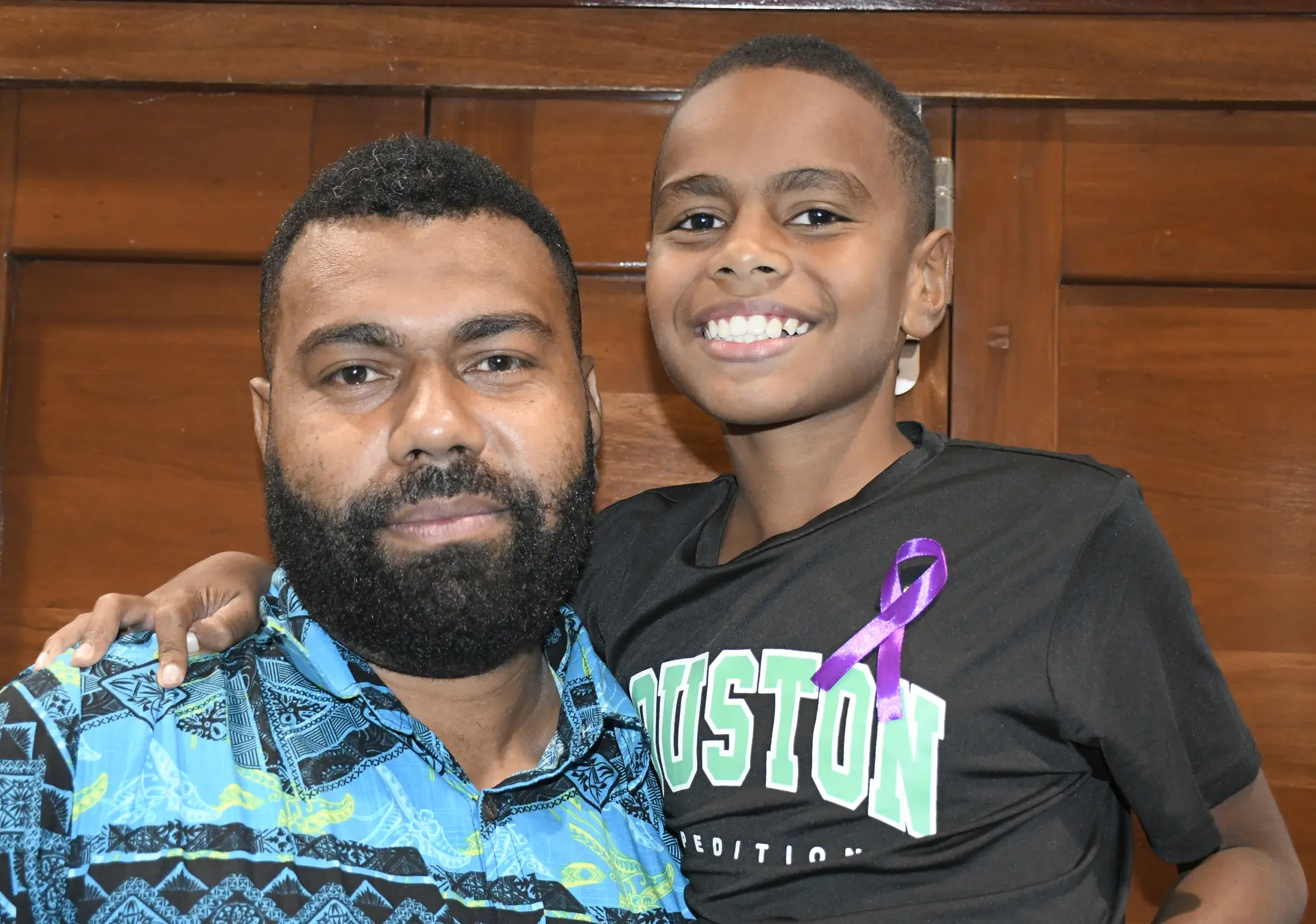 Akariva Tawake with his son, Nimilote Naisorotabu. 