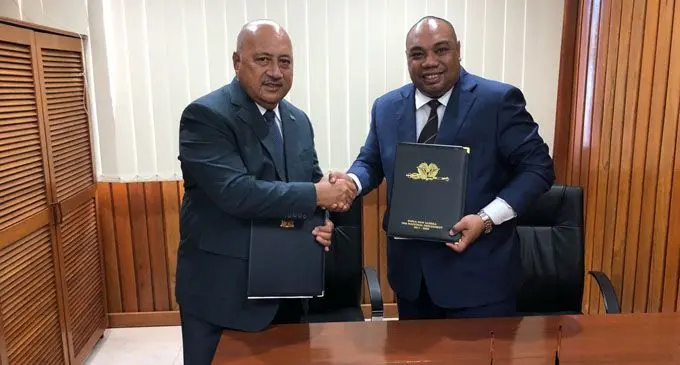 Ratu Inoke Kubuabola (left) with Jelta Wong after the signing the Memorandum of Understanding on Police Co-operation. Photo: Foreign Affairs