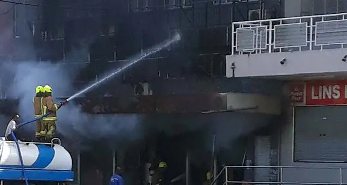 Firefighters from the National Fire Authority work to contain the fire at the A.Gafoor building in Rakiraki town on May 25, 2020. Photo: Ilaisa Vakaloloma