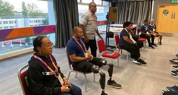 Sitting first and second from left, Ana and Derek Derenalagi with Team Fiji Chef de Mission Sale Sorovaki (standing) during Team Fiji assembly on July 27, 2022. Photo: FASANOC Para Olympian Derenalagi Meets Team Fiji FIJI SUN | THURSDAY, JULY 28, 2022 | FIJISUN.COM.FJ