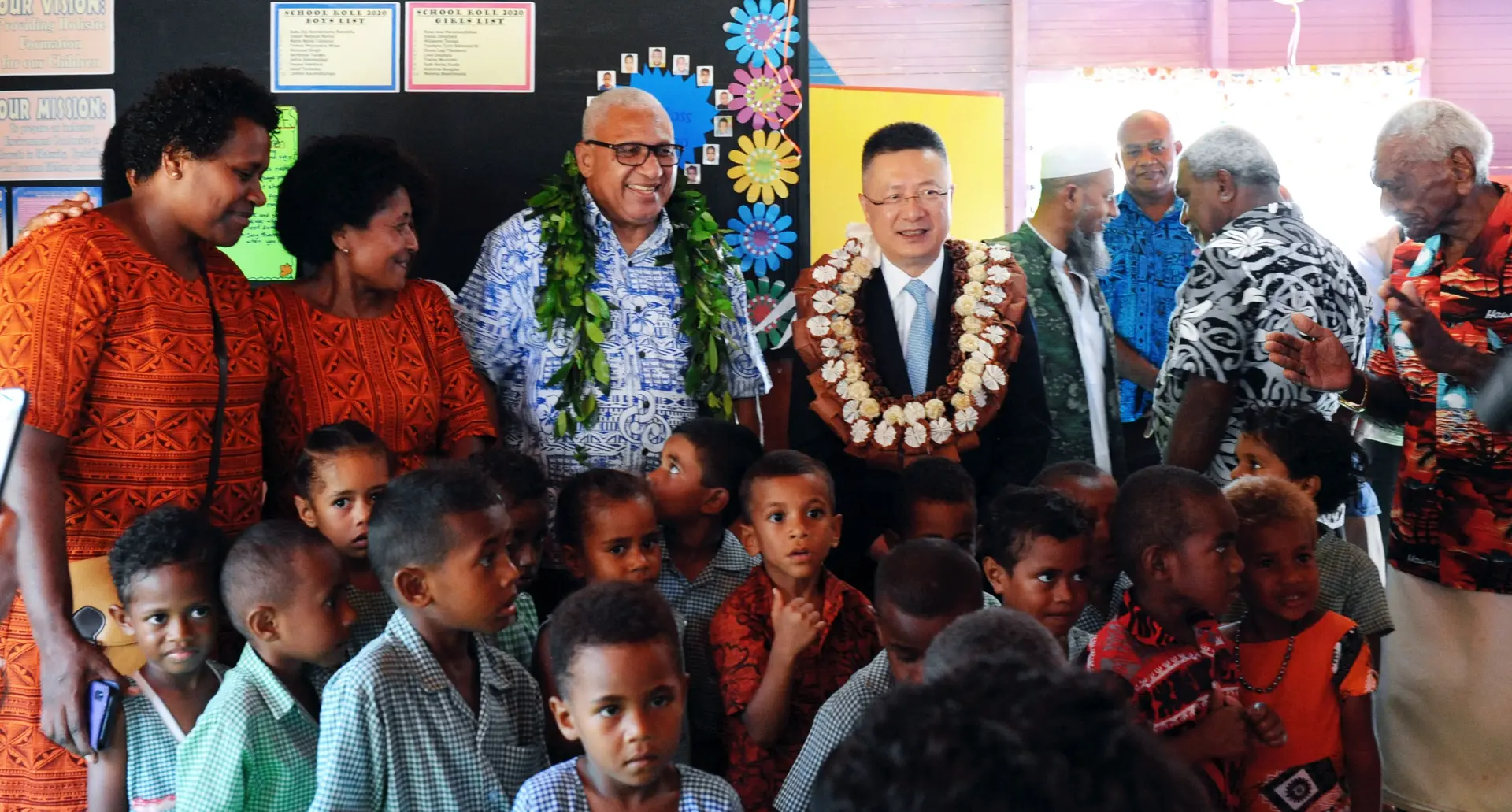 Prime Minister Voreqe Bainimarama and Chinese Ambassador Qian Bo with students and guests at the opening of the Lokia Community Kindergarten 