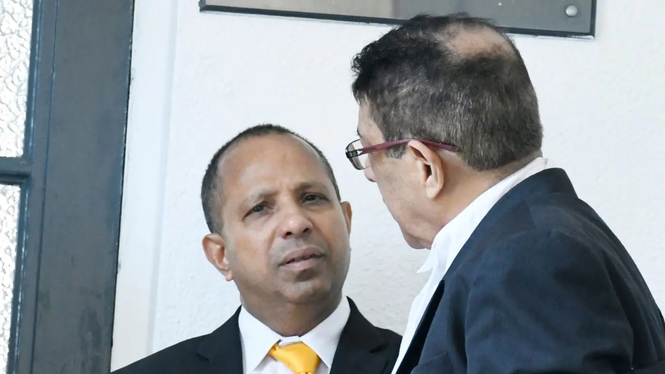 Mohammed Fareed with Lawyer Hemendra Nagin  outside High Court on October 16, 2026. 