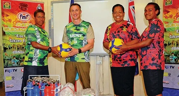 From left: RFMF women’s volleyball team captain, Timaima Lomani,  Australian Defence Attaché Colonel Robert Haertsch, Colonel Litea Seruiratu and  netball captain, Private Seruwaia Kovakova during the handover of their uniforms at the RFMF strategic headquarters, in Suva, on December 8, 2020. Photo: RFMF Media. 