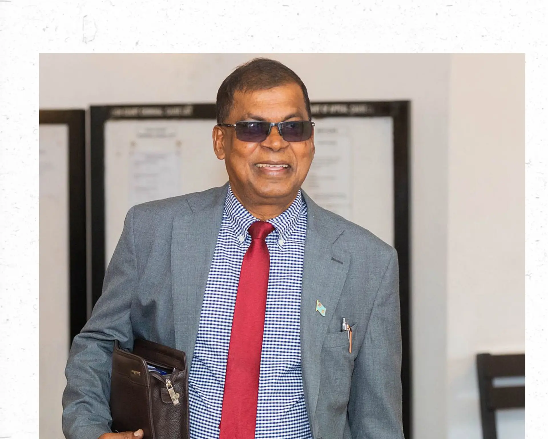 Former Deputy Prime Minister Biman Prasad outside the High Court in Suva on May 18, 2026.  