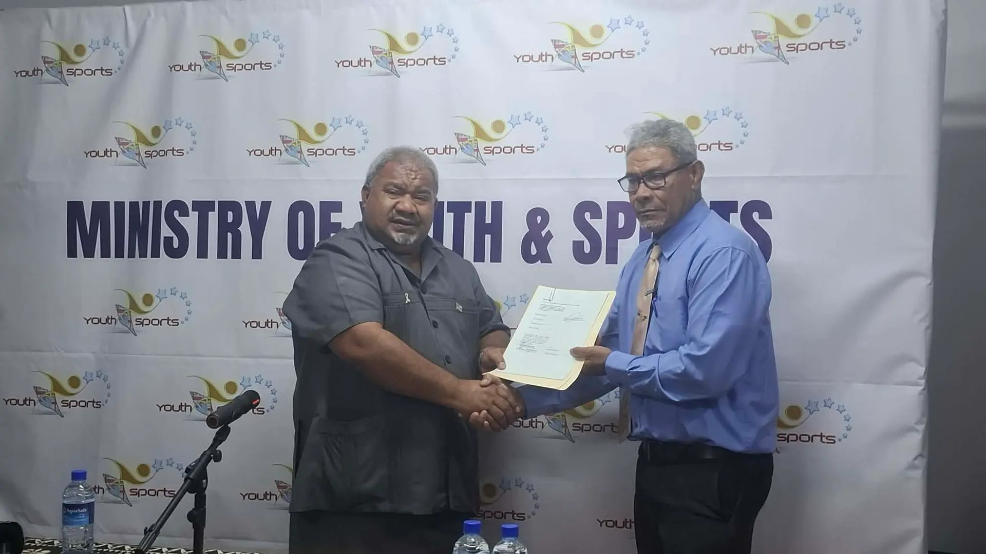 Boxing Commission of Fiji chairman Eroni Loganimoce (left) with Minister for Youth and Sports Jese Saukuru.