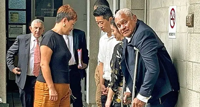 Carpenters Fiji Limited managing director, Daniel Whippy (far right with crutches), with his family outside the Suva Magistrate’s Court on November 6, 2024. Photo: Beranadeta Nagatalevu