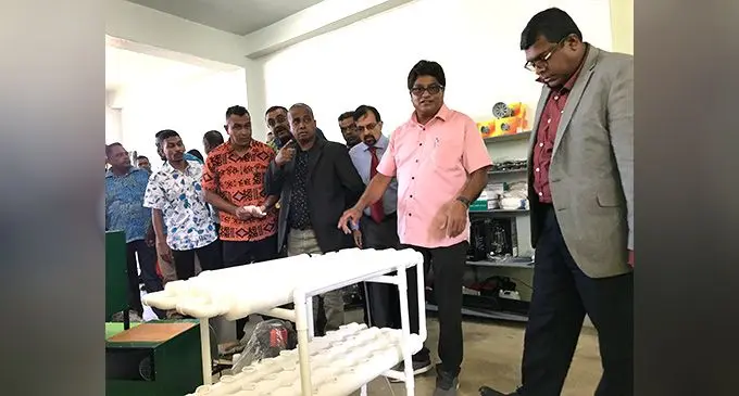 From right: Minister for Agriculture, Mahendra Reddy, SSUP Farm Machinery and Equipment chief, Peter Sahay, with in Labasa, on June 9, 2022. Photo: Shratika Naidu 