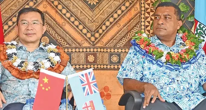 Chinese Ambassador to Fiji, Zhou Jian with the Minister for Housing and Local Goverment, Maciu Katamotu in Sigatoka.