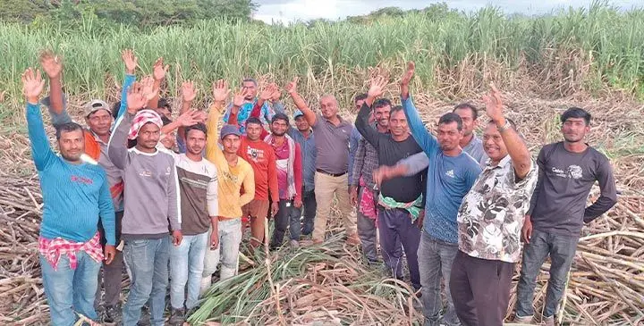 Permanent Secretary for Sugar Vinesh Kumar (seventh from right), with Bangladeshi workers. Photo: Waisea Nasokia