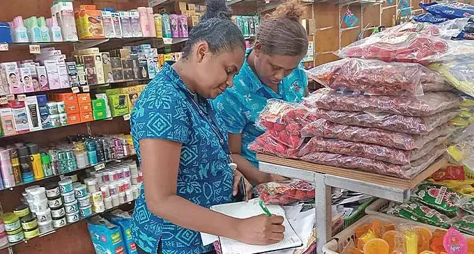 Lautoka City Council food inspectors Loami Lauwai and Seini Ubitau during their inspection.
