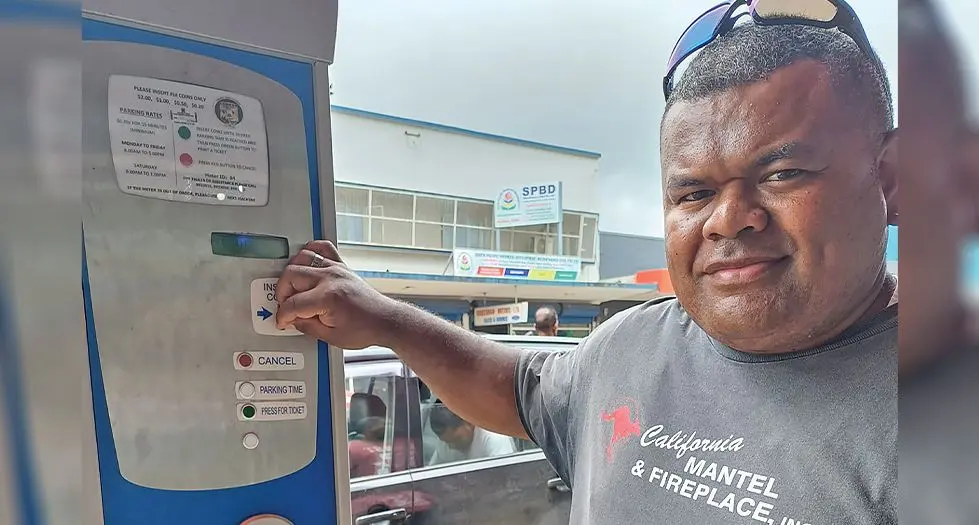 Apisai Koroi using digital parking meter in Labasa Town on December 22, 2023. Photo: Shratika Naidu