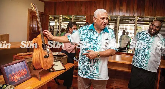 Prime Minister Voreqe Bainimarama alongside Forestry Director Timber Utilisation Research and Training Tevita Bulai during the International Day of Forests celebration in Narere on March 21 2022. Photo: Leon Lord.