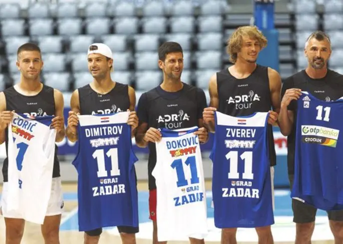 Serbian tennis player Novak Djokovic (C) poses with Borna Coric (1st L), Grigor Dimitrov (2nd L), Alexander Zverev (2nd R) and Goran Ivanisevic after a friendly basketball match ahead of the Adria Tour humanitarian tennis tournament in Zadar, Croatia, June 18, 2020. (Marko Dimic/Pixsell via Xinhua)