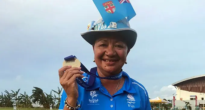 Litia Tikoisuva wins gold in the Women's Singles Bowling event beating Norfork Island 21-12 in the final at Lawn Bowls Centre in Faleata, Samoa. Photo: Anasilini Natoga  