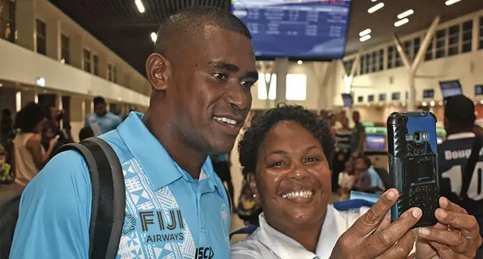 Fiji Airways 7s rep Aminiasi Tuimaba with a fan at the Nadi International Airport on February 22, 2019. Photo: Waisea Nasokia