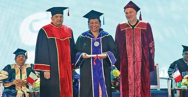 Ivamere Luita (middle) after her graduation from the Ascencia Business School at the United Arab Emirates.