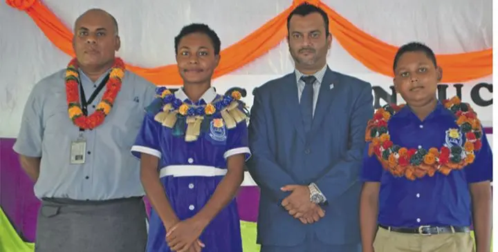 From Left: Macuata District Officer Alifereti Abenasiga, head girl Mere Racoqe, Assistant Minister for Employment, Productivity and Industrial Relations, Alvick Maharaj and headboy Jaishil Prasad after the prefect induction on January 31, 2019. Photo: Laisa Lui