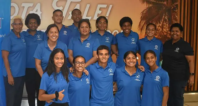 Natabua High School’s Ofa Lagonilakeba (standing second from right) with the Fiji swimming development team at Nadi International Airport on August 21, 2022. Photo: Waisea Nasokia