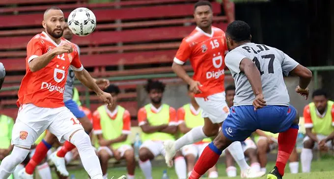 Rewa’s Tevita Waranaivalu (left) tries to maintain possession against Navua during their match at Ratu Cakobau Park, Nausori on August 21, 2022. Photo: Fiji FA Media
