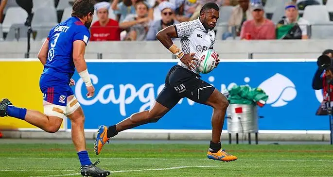 Fiji Airways Fijian 7s forward Sevuloni Mocenacagi (right), in action.