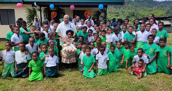 Prime Minister Voreqe Bainimarama with students of Naboro Sawanikula Primary School during the opening of the teachers quarters on October 31, 2019. Photo: DEPTFO News