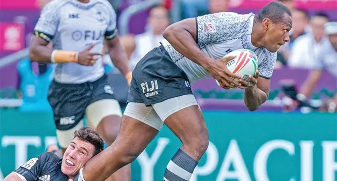 Fiji Airways Fijian 7s captain Paula Dranisinukula  charges ahead as he is tackled by New Zealand 7s forward Sam Dickson in their clash at the Honk Kong Stadium on April 6, 2019. Photo: Kitione Rokomanu/ZoomFiji 