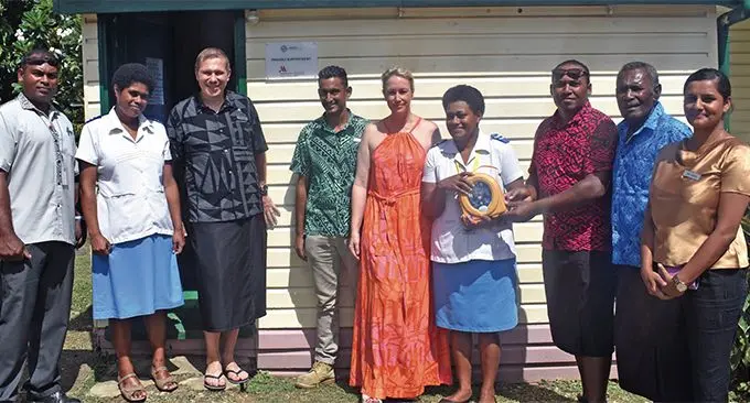 Fiji Marriott Resort Momi Bay general manager Silvano Dressino (third from left), his wife Katrin (fifth from left), Tau Village headman Meli Limalevu (third from right) outside the Tau Nursing Station on March 7, 2019. Photo: Nicolette Chambers