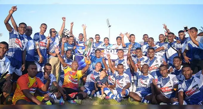 Al-Hamd Smart Living Fiji Police Force football team with their FMF Ratu Sukuna football trophy after defeating the Republic of Fiji Military Forces 3-1 at Bidesi Park, Suva, on November 24, 2022 . Photo: Ronald Kumar