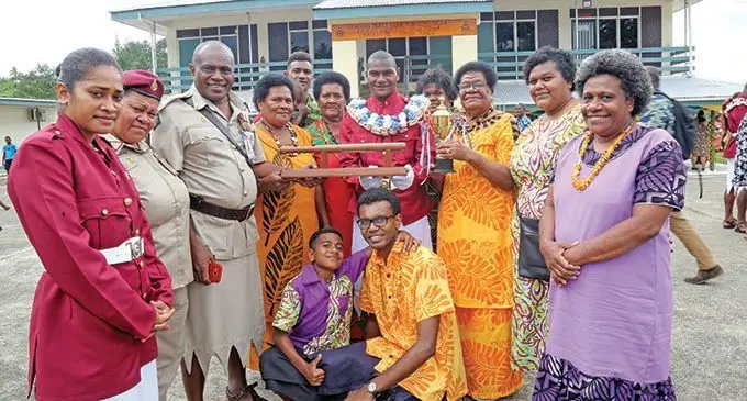 Baton of Honour and Best in Physical Training recipient Sosiceni Vusonivere with his family after the Fiji Corrections Service passing-out parade on November 22, 2019.  Photo: Kelera Sovasiga