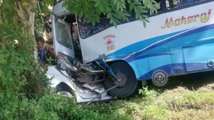 The bus on top of the car.