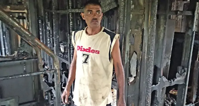 Sanjay Kishore Chand inside his burnt home at Natabua in Lautoka yesterday.