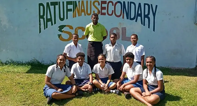 Manasa Yavala with the Year 11 students of Ratu Finau Secondary School in Lau. Sitting second from left is his younger sister, Vika Yavala. 