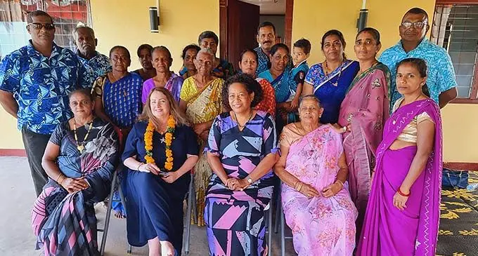 Ministry of Women, Children and Poverty Alleviation, Permanent Secretary, Jennifer Poole(sitting second from left), with members from the Vunimoli Sanatan Mother’s club, community men and (far right-second row) area advisory councillor, Navin Kumar(standing far right), during an awareness session and visit recently in Labasa.. Photo: Sampras Anand