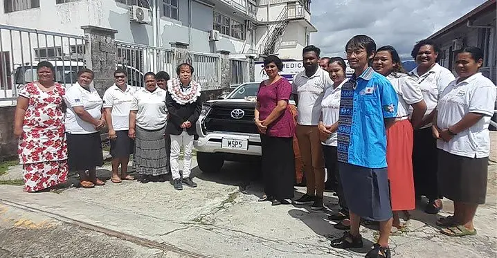 Counsellor and deputy chief of mission from the Embassy of Japan, Tanaka (wearing garland) and Medical Services Pacific (MSP) country director Ashna Shaleen with staff from the MSP and the Embassy of Japan and one of the donated 4WD vehicles on February 15, 2023. Photo: Wati Talebula-Nuku